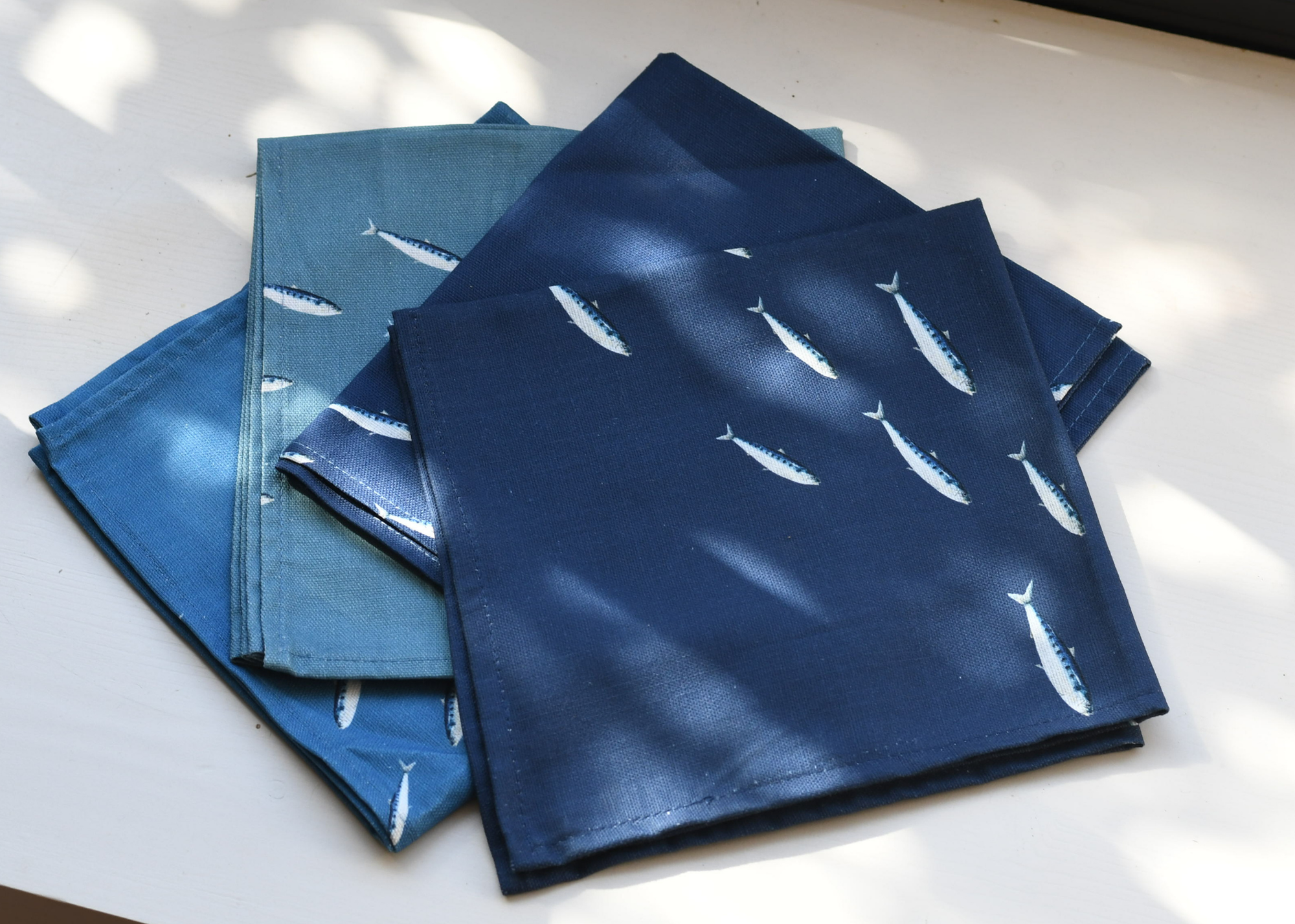 Pack de 4 serviettes de table : Le banc de Sardines